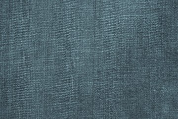 textured background from denim of indigo color
