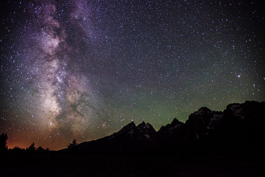 Scenic view of starry sky over mountains
