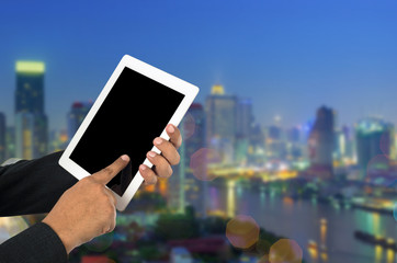 Businessman using tablet pc.