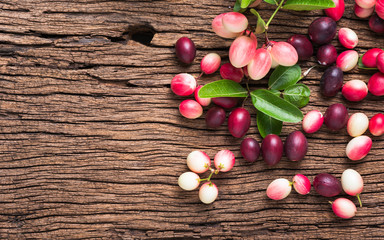 carunda fruit on old wood background