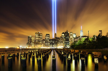 View of modern cityscape with Tribute in Light at night