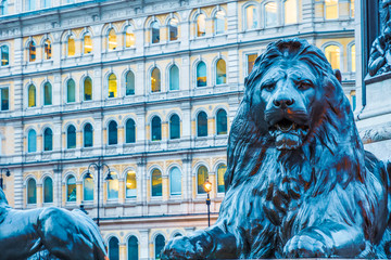 Vintage looking sculpted lion at Trafalgar Square in London