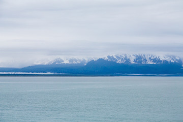 Snowy Mountains in Blue Distance