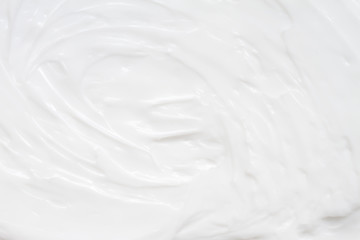 Cosmetics. Cream white background texture.