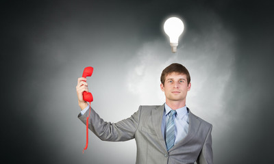 Businessman with red receiver