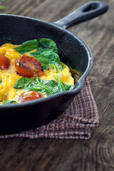 Spinach frittata in iron skillet - closeup