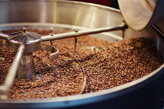 Close-up of coffee beans in roaster