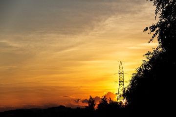 Naklejka premium power line on a sunset background