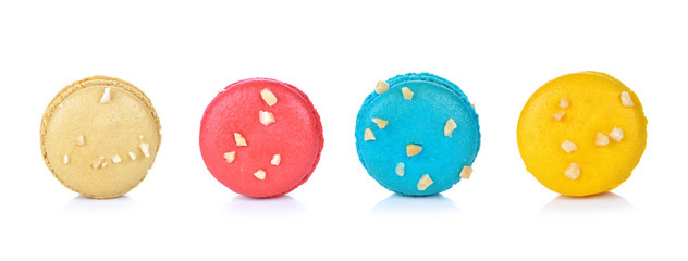 French colorful macarons isolated on white