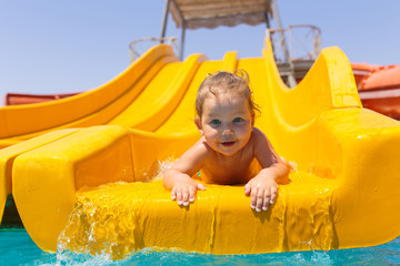 little girl on water slide