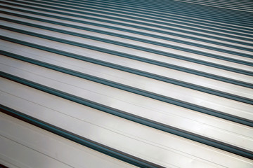 Metal panel building roof construction
