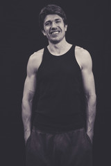 Naklejka premium Lean man in vest top in studio