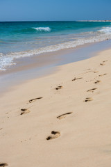 Fototapeta na wymiar Footsteps on the beach in Sal, Cape Verde, Africa