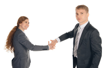 two persons in suits given hands