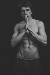 Fototapeta premium Portrait of a Muscular man in a studio