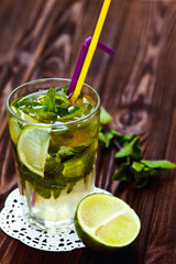 Tradition Summer drink mojito with lime and mint.