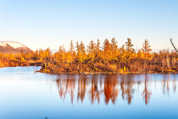 Mountain lake in tundra, deep autumn in the Taimyr Peninsula near Norilsk.