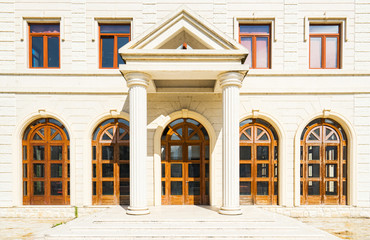 Exterior of a Town House with column.