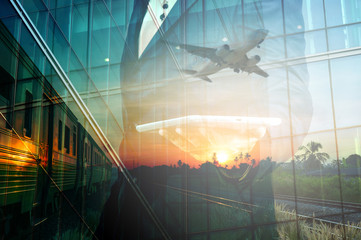 Double Exposure of BusinessMan Hold Tablet and Train, Airplane
