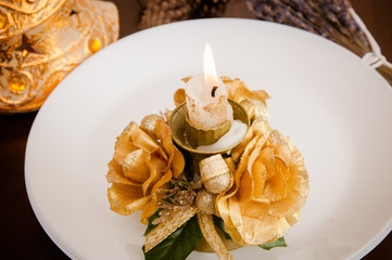plate fork linen napkin on table with Christmas tree decorated