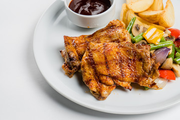 steak with potatoes and vegetables