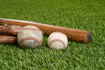 closeup soft ball and hardball