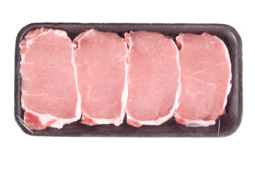 Packed pieces of pork meat, isolated on white