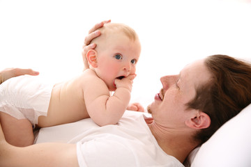 Young father having fun with his little son