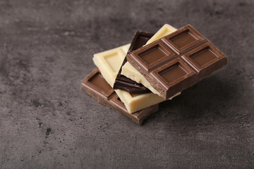 Mix of chocolate on grey background