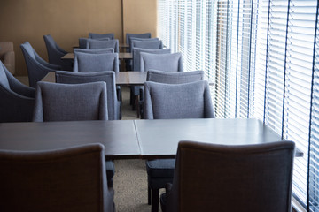 rows of chairs in meeting room