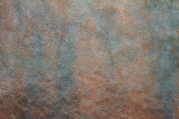 dark brown leather texture closeup can be used as background.