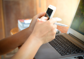 hand using phone