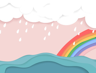 Rainy cloud and rainbow over the sea