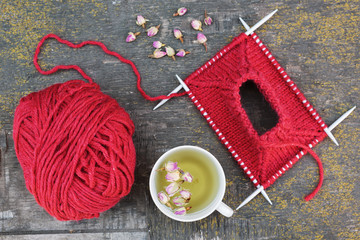 Knitting and tea with roses