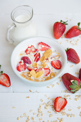 Porridge with fresh strawberry and milk