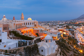 St. Gerasimos Christian Church of Fira, modern capital of the Greek Aegean island, Santorini, during twilight blue hour, Greece