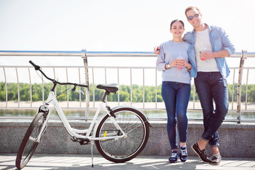 Fototapeta premium Smiling couple having a drink