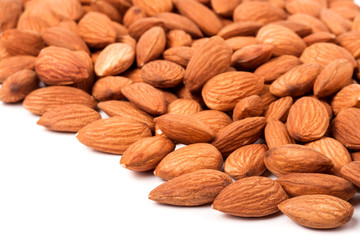 peeled almonds isolated on a white background 