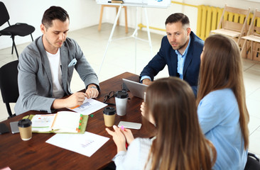 Creative business team working hard together in office