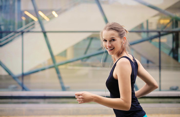 Smiling woman running