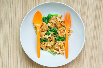 Fried noodles with pork sauce.