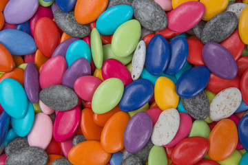 Fototapeta na wymiar Drops of candies coated chocolate. Various colors