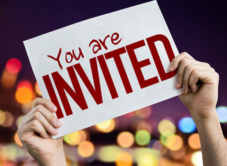 You Are Invited placard with night lights on background