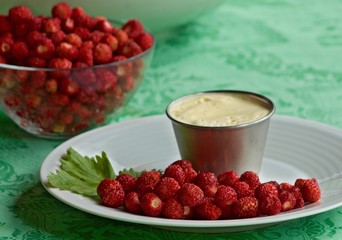wild strawberries served with dessert