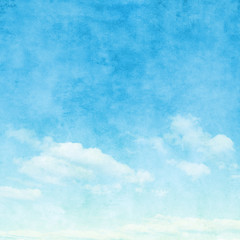 Fototapeta na wymiar Blue sky with clouds in grunge style.