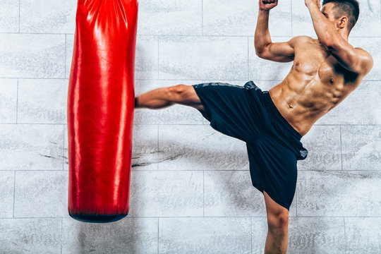 Young Man Kickboxing Workout

