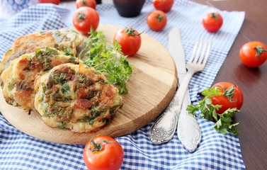 Chopped chicken cutlets with spinach