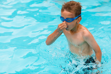 Boy in swimming pool © Mikkel Bigandt