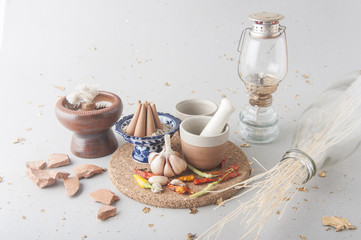 Thai herb ingredient, spicy food in mortar isolated on white background