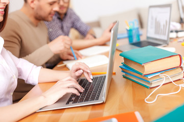 College students studying together at home